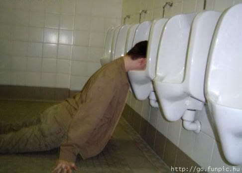 toilet-humor-passed-out-in-urinal.jpg