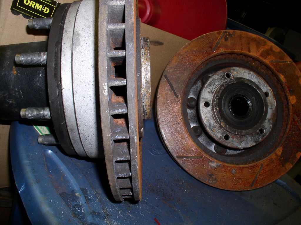 Newb with a problem. Caliper bracket hitting new rotor Ford Power