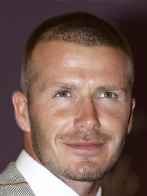 david beckham armani exchange. David Beckham, 33, looks like